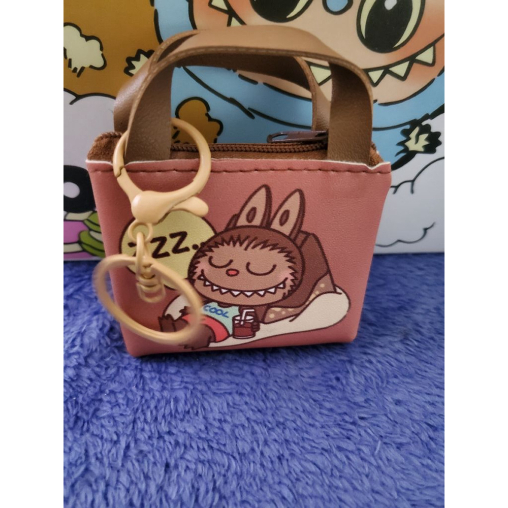 He just taking a nap. Labubu Dusty Rose & Brown Mini Bag charm or Keychain